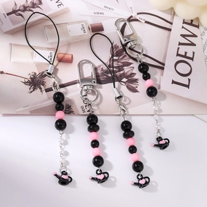 Bijou de téléphone perlé avec cœur rose et pendentif théière noire tendance