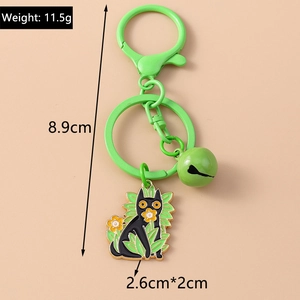 Detail view of cartoon cat keychain set with weight and size dimensions labeled