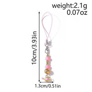 Detailed view of 2.1g pink beaded phone strap with heart kettle charm and size markings