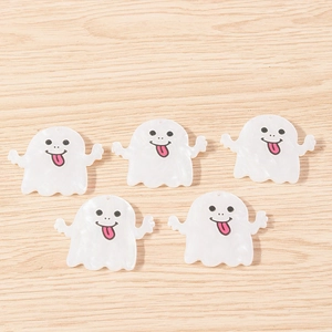 Five cute Halloween ghost charms for DIY jewelry making on a light wood background