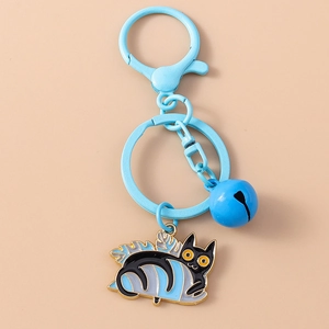 Detail of light blue cartoon cat keychain with enamel finish and black spring clasp