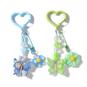 Porte-clés perlés avec papillons et fleurs en bleu et vert pour les sacs