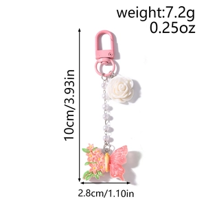 Detailansicht der Gänseblümchen-Rosen-Schlüsselanhänger mit Maßen 10cm x 2,8cm und Gewicht