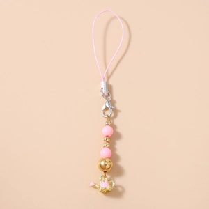 Detail of pink beaded phone strap with golden beads and a small water can pendant