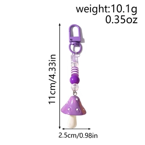 Detail view showing dimensions of purple mushroom keychain with beaded chain and spring hook