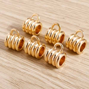 Set of 6 gold plated cylindrical spacer beads with grooved texture for DIY jewelry making
