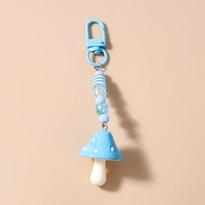 Blue mushroom keychain pendant with striped beads and a durable metal D-ring clasp