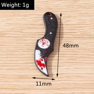 Detail view of 48mm creative Halloween cleaver charm with blood splatter and size specs