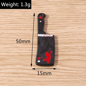 Detail view of a 50mm horror bloody cleaver pendant for Halloween DIY jewelry making