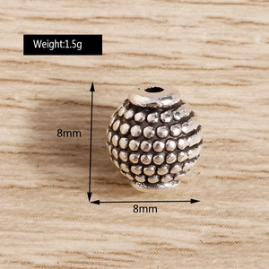Macro view of 8mm vintage silver lantern bead for DIY jewelry with 1.5g weight detail