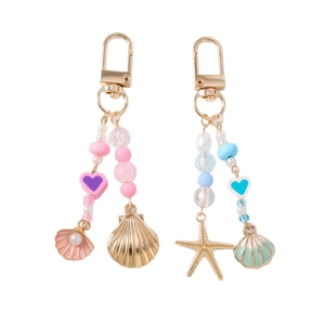 Ocean themed beaded keychain with starfish and shell pendants in pink and blue