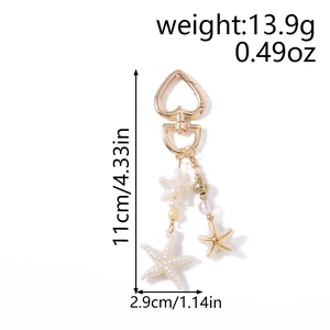 Detailed view of starfish keychain with dimensions 11cm height and 2.9cm width