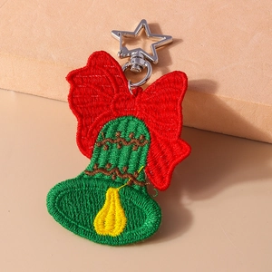 Handmade Christmas bell embroidery keychain with red bow and star-shaped silver clasp