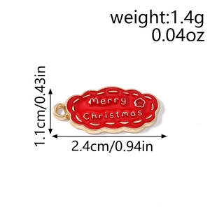 Vue détaillée de la taille du pendentif de Noël en émail rouge avec poids et dimensions
