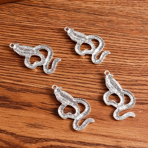 Set of 4 vintage silver cobra snake charms with scales for DIY jewelry making and pendants