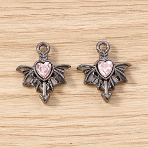 Gothic pink heart charms with black bat wings and arrow detail for DIY jewelry making