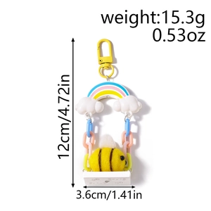 Detail view of cute bee on swing keychain with weight and size specifications