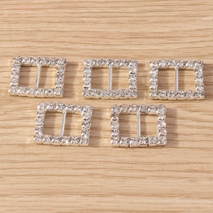 Macro view of silver rectangular rhinestone slide buckles for DIY jewelry accessories