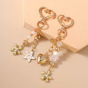 Porte-clés à perles tendance avec breloques cœur et étoile de mer en alliage doré