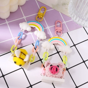 Handmade crochet pig and wool felt bee keychain charms with rainbow link chain