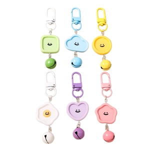 Lot de porte-clés colorés en silicone avec visages souriants et petites clochettes pastels