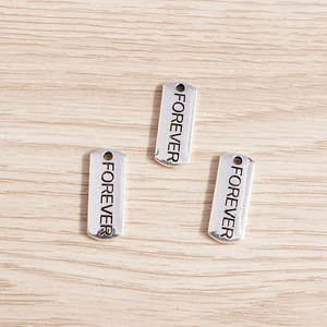 Set of three antique silver vertical rectangle pendants engraved with Forever for DIY jewelry