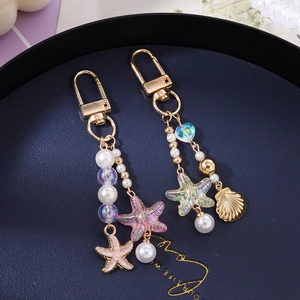 Starfish heart pearl keychain with shell charm and golden clasp for bags