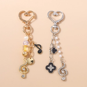Porte-clés Note de Musique Trèfle Clé de Sol Fermoir Coeur Strass Künstliche Perle d'Imitation Künstliche Perles Pendentif Sac Bijoux Cadeau Femme