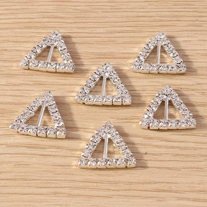 Detail showing silver triangle geometric pendants with sparkling crystal rhinestones set of six