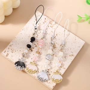 Fashionable seashell and pearl phone straps with striped beads in four diverse colors