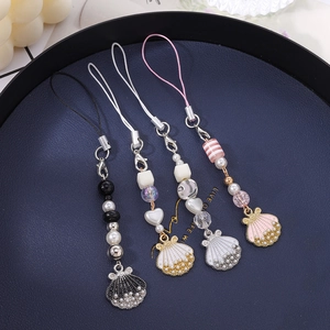 Fashionable shell and pearl phone charms with beaded straps and lobster clasps in four colors