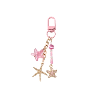 Porte-clés étoile de mer rose et doré avec perles et mousqueton D pour sac à main