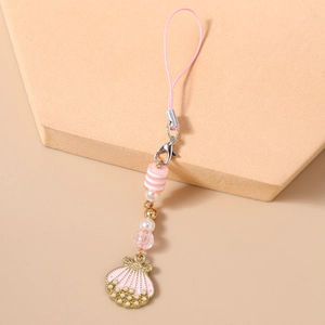 Detail of pink shell pendant and striped beads for phone strap or keychain