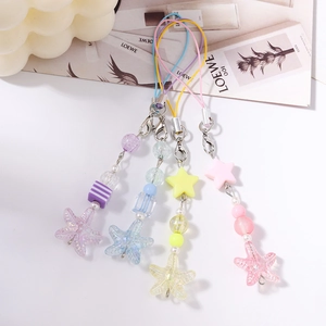 Detail of nautical beaded phone charms with resin starfish pendants in four colors