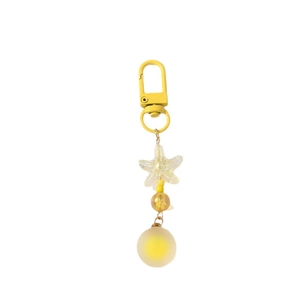 Beaded starfish keychain with frosted yellow spheres and matte metallic clasp