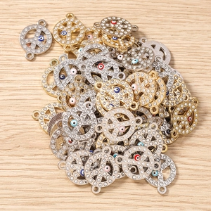 Macro di ciondoli segno della pace con strass e malocchio per creazione gioielli fai da te
