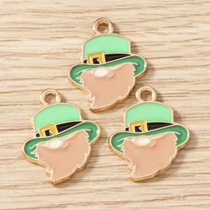 Macro detail of St. Patrick's Day Leprechaun hat pendants for DIY jewelry making
