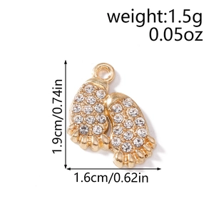 Golden paw footprint pendant with rhinestones including size and weight measurements