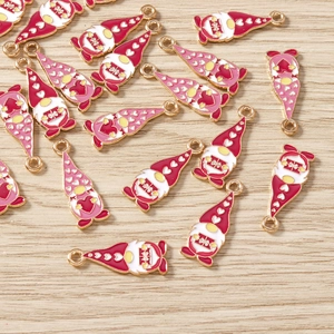 Macro detail of colorful cartoon gnome alloy pendants with heart motifs for DIY jewelry craft