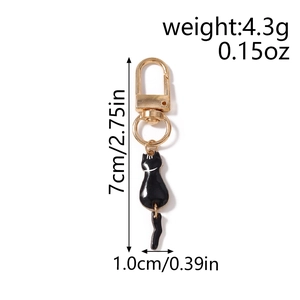 Detailed dimensions of gold alloy black cat keychain showing 7cm length and 4.3g weight