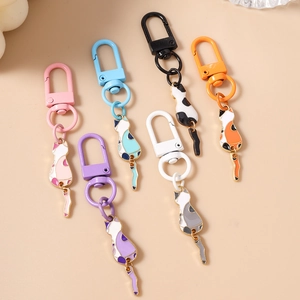 Set of six colorful cartoon cat enamel keychains with golden plating and lobster clasps