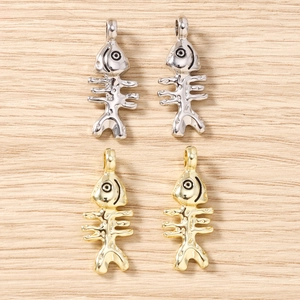 Gepolijste visgraat hangers in goud en zilver voor doe-het-zelf sieraden en knutselen