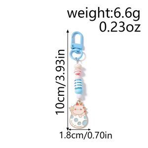 Detail showing a blue beaded cartoon dinosaur keychain with size labels and lobster clasp