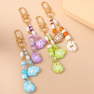 Fashionable beaded food keychains in four colors with cookie and cloud pendants