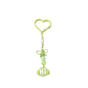 Porte-clés à perles vert clair avec fermoir coeur, perles, nœud et charme nuage