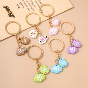 Set of 6 colorful cartoon biscuit and cloud keychains with golden metal rings