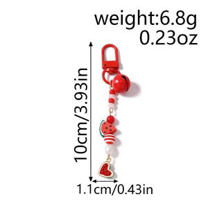 Beaded watermelon keychain detail with dimensions 10cm by 1.1cm and 6.8g weight