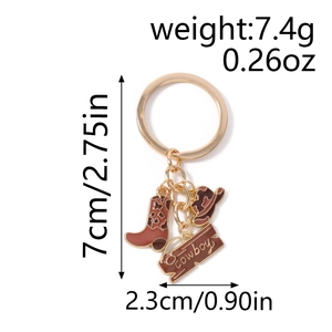 Detailed view of enamel cowboy boot and hat keychain charms with precise size measurements
