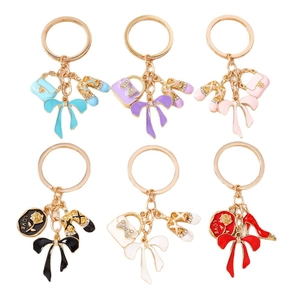 Set of 6 rhinestone bow and high heel bag charms with rose coin accents in various colors