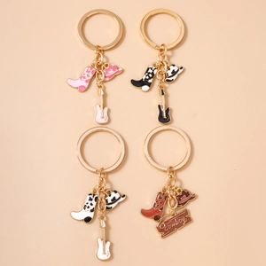 Western cowboy keychain set with enamel boots, hat and guitar charms in gold finish